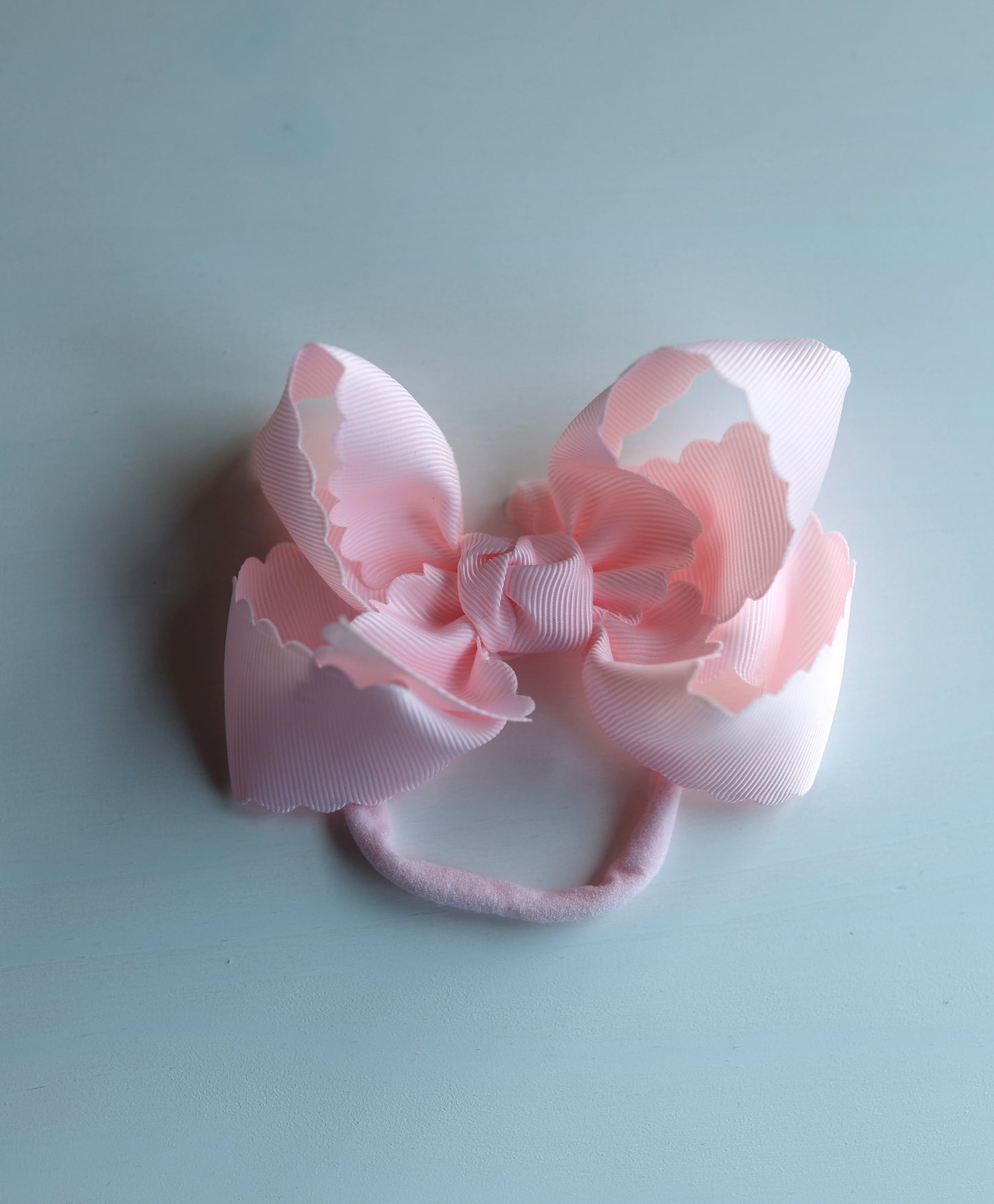 Baby Pink Scalloped Bow on NYLON